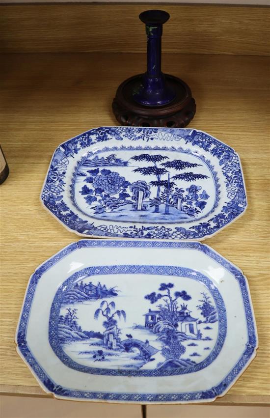 Two 18th century Chinese export blue and white octagonal dishes and a hardwood stand